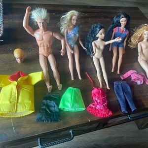 Large lot of Barbie and ken.
